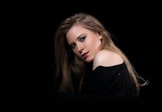Sexy glamour female model with long blond hair posing in black s Stock Photography Sexy glamour female model with long blond hair posing in black s Stock Photography