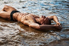 Sexy Mann am Strand Stockfotos Sexy Mann am Strand Stockfotos