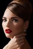 model with retro make-up, hairstyle & jewelry stock photo model with retro make-up, hairstyle & jewelry stock photo