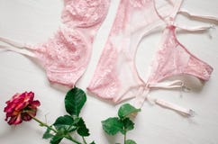 pink lingerie set with stocking suspender. Lace underwear o