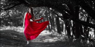 woman with naked breast in red dress in fairy forest. royalty free stock photo woman with naked breast in red dress in fairy forest. royalty free stock photo
