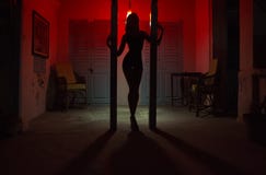Sexy Woman Silhouette Dancing at the Hotel. Pole Dancer female S Stock Photo Sexy Woman Silhouette Dancing at the Hotel. Pole Dancer female S Stock Photo