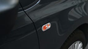 Señal de vuelta del coche Señal de vuelta del coche