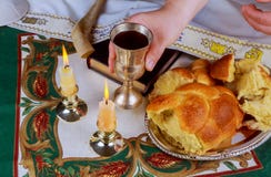 Shabbat eve table with uncovered challah bread, Sabbath candles stock image Shabbat eve table with uncovered challah bread, Sabbath candles stock image