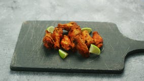 Chicken wings with lime slices
