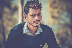 Shallow Focus Photography of Man Wearing Blue Sweater Royalty Free Stock Photos Shallow Focus Photography of Man Wearing Blue Sweater Royalty Free Stock Photos