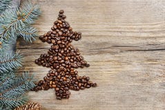 Shape of christmas tree made of coffee beans