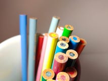 Sharpened Colored Pencils sticking out of a cup upside down. royalty free stock photography Sharpened Colored Pencils sticking out of a cup upside down. royalty free stock photography
