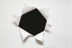 The sheet of paper with the hole