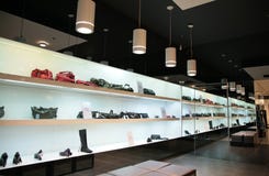 Shelfs in store with bags and shoes