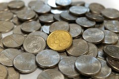 Fifty euro cents coin on a pile of rubles stock image Fifty euro cents coin on a pile of rubles stock image