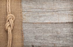Ship Rope On Wood And Burlap Texture Background Stock Photo Ship Rope On Wood And Burlap Texture Background Stock Photo