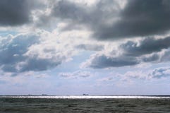 Ships on the horizon, stormy sea, gloomy sky royalty free stock photo Ships on the horizon, stormy sea, gloomy sky royalty free stock photo