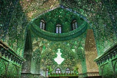 The magnificent beauty of the Shah-e-Cheragh Shrine mosque, decorated in green with numerous mirrors in Shiraz, Iran royalty free stock image The magnificent beauty of the Shah-e-Cheragh Shrine mosque, decorated in green with numerous mirrors in Shiraz, Iran royalty free stock image