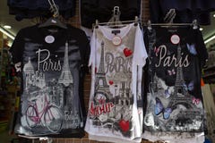 Shirts with Paris logo on sale in Montmartre souvenir shop in Paris, France. stock images Shirts with Paris logo on sale in Montmartre souvenir shop in Paris, France. stock images