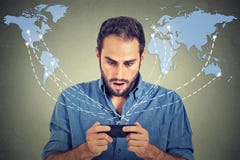 Shocked business man holding using smartphone royalty free stock images Shocked business man holding using smartphone royalty free stock images