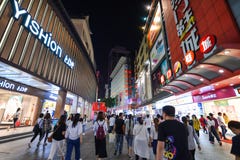 Shoppers and visitors crowd the famous Dongmen Pedestrian Street. Dongmen is a shopping area of Shenzhen royalty free stock photos Shoppers and visitors crowd the famous Dongmen Pedestrian Street. Dongmen is a shopping area of Shenzhen royalty free stock photos