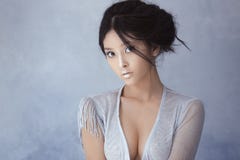 Shot of a futuristic tender young asian woman. Royalty Free Stock Photography Shot of a futuristic tender young asian woman. Royalty Free Stock Photography