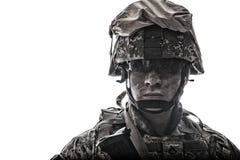 Equipped army soldier with dirty face studio shot stock images Equipped army soldier with dirty face studio shot stock images
