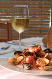 Shrimp dish with glass of white wine - clipping pa