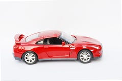 Side Face Of A Red Model Sport Car Stock Photo