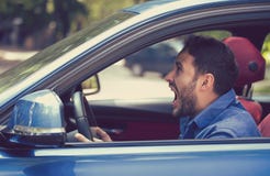 Side profile angry driver. Negative emotions face expression stock image Side profile angry driver. Negative emotions face expression stock image