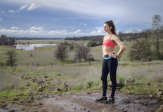 Side profile of pretty, woman jogger outdoors royalty free stock photo Side profile of pretty, woman jogger outdoors royalty free stock photo