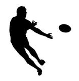 Side Profile of Rugby Speedster Passing the Ball Royalty Free Stock Photography Side Profile of Rugby Speedster Passing the Ball Royalty Free Stock Photography