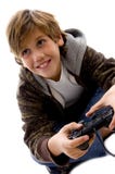 Side View Of Amused Boy Playing Videogame Stock Image