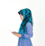 Portrait of a Muslim Islam woman isolated on white background royalty free stock photo Portrait of a Muslim Islam woman isolated on white background royalty free stock photo
