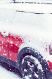 Side view of a red car covered after snowfall. Toned. Side view of a red car covered after a recent snowfall. Toned Royalty Free Stock Images Side view of a red car covered after snowfall. Toned. Side view of a red car covered after a recent snowfall. Toned Royalty Free Stock Images