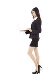 Young business woman holding laptop royalty free stock photography Young business woman holding laptop royalty free stock photography