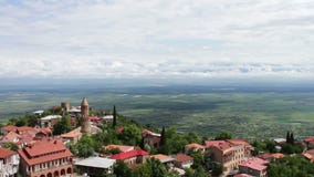 Sighnaghi, Georgia. Panoramic View on the City Landscape.,View from the top of a picturesque Alazani Valley. stock video Sighnaghi, Georgia. Panoramic View on the City Landscape.,View from the top of a picturesque Alazani Valley. stock video