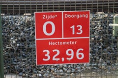 Sign for firefighters, paramedics and police where and which entrance it is to busy railroad track at Zwijndrecht. royalty free stock photos Sign for firefighters, paramedics and police where and which entrance it is to busy railroad track at Zwijndrecht. royalty free stock photos