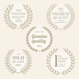Signes et emblèmes de qualité avec la guirlande de laurier illustration de vecteur Signes et emblèmes de qualité avec la guirlande de laurier illustration de vecteur