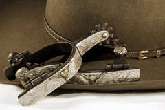 Silberne Sporne und ein Cowboyhut Silberne Sporne und ein Cowboyhut