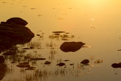 Silent calm lake at sunset Karelia, Russia. Orange natural background royalty free stock images Silent calm lake at sunset Karelia, Russia. Orange natural background royalty free stock images
