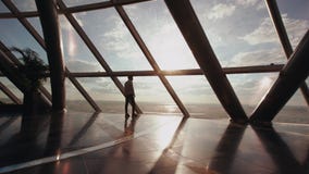 Silhouette of businessman stand near window in modern office building Royalty Free Stock Photo Silhouette of businessman stand near window in modern office building Royalty Free Stock Photo