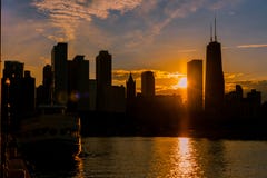 Silhouette of Chicago skyline viewed from the pier with orange a stock photo Silhouette of Chicago skyline viewed from the pier with orange a stock photo