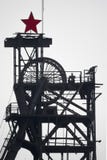Silhouette colliery coal mine with wheels and soviet star royalty free stock photo Silhouette colliery coal mine with wheels and soviet star royalty free stock photo