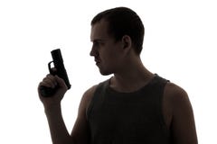 Silhouette of criminal man holding gun isolated on white. Background Royalty Free Stock Images Silhouette of criminal man holding gun isolated on white. Background Royalty Free Stock Images