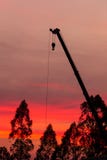 Silhouette de chantier de construction sur le fond de coucher du soleil photographie stock Silhouette de chantier de construction sur le fond de coucher du soleil photographie stock