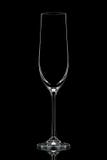 Silhouette du verre blanc de champagne sur le noir Images libres de droits