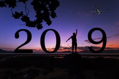 Silhouette freedom young man on the stone in sunrise or sunset o royalty free stock image Silhouette freedom young man on the stone in sunrise or sunset o royalty free stock image