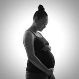 Silhouette of happy mother expecting baby Royalty Free Stock Photography Silhouette of happy mother expecting baby Royalty Free Stock Photography