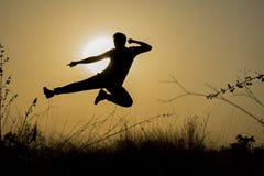 Silhouette of Man Doing Kick Jump during Sunset Royalty Free Stock Photo Silhouette of Man Doing Kick Jump during Sunset Royalty Free Stock Photo