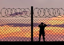 Silhouette of a military border guard