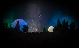 Silhouette Of A Large Crowd Of People In Forest At Night Watching At Rising Big Full Moon. Decorated Background With Night Sky Wit Royalty Free Stock Photography