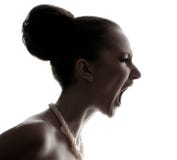 Silhouette Of Beautiful Young Woman Shouting Stock Images