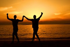 Silhouette People on Beach at Sunset Royalty Free Stock Photo Silhouette People on Beach at Sunset Royalty Free Stock Photo